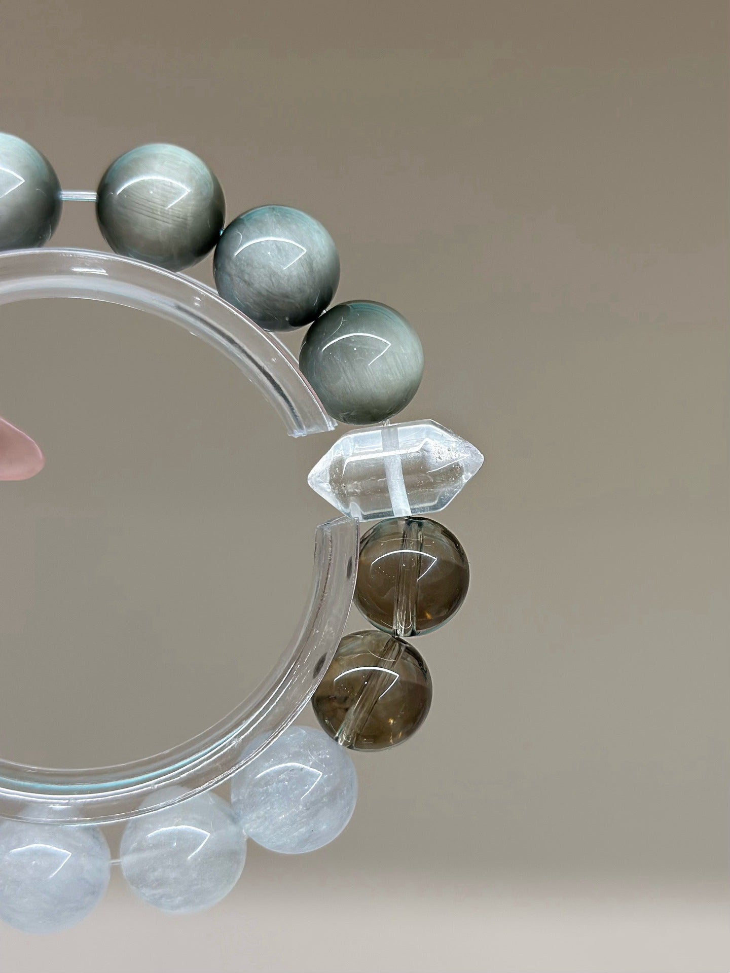 Natural crystal couple bracelet with white fluorite, hawk's eye and smoky quartz
