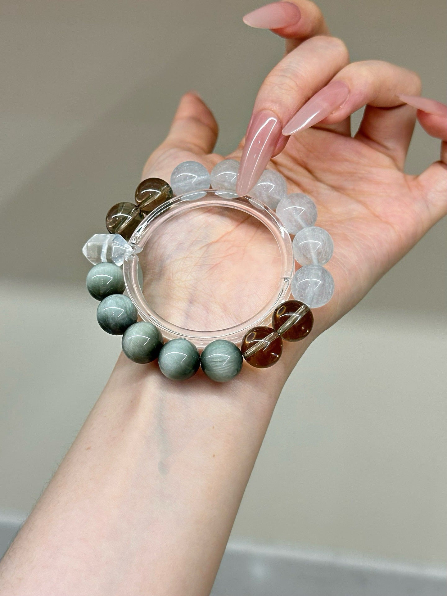 Natural crystal couple bracelet with white fluorite, hawk's eye and smoky quartz