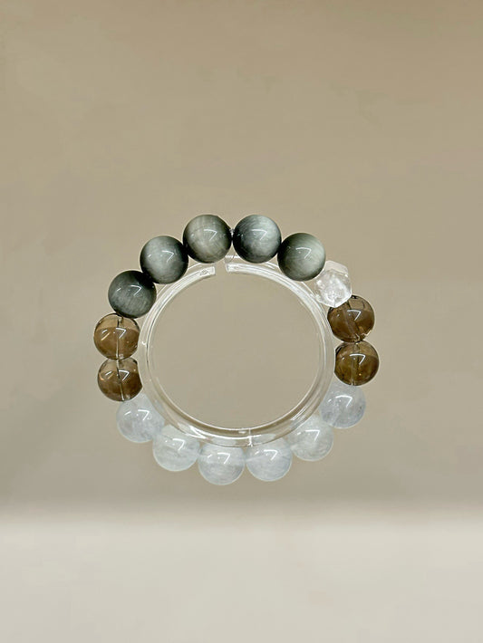 Natural crystal couple bracelet with white fluorite, hawk's eye and smoky quartz