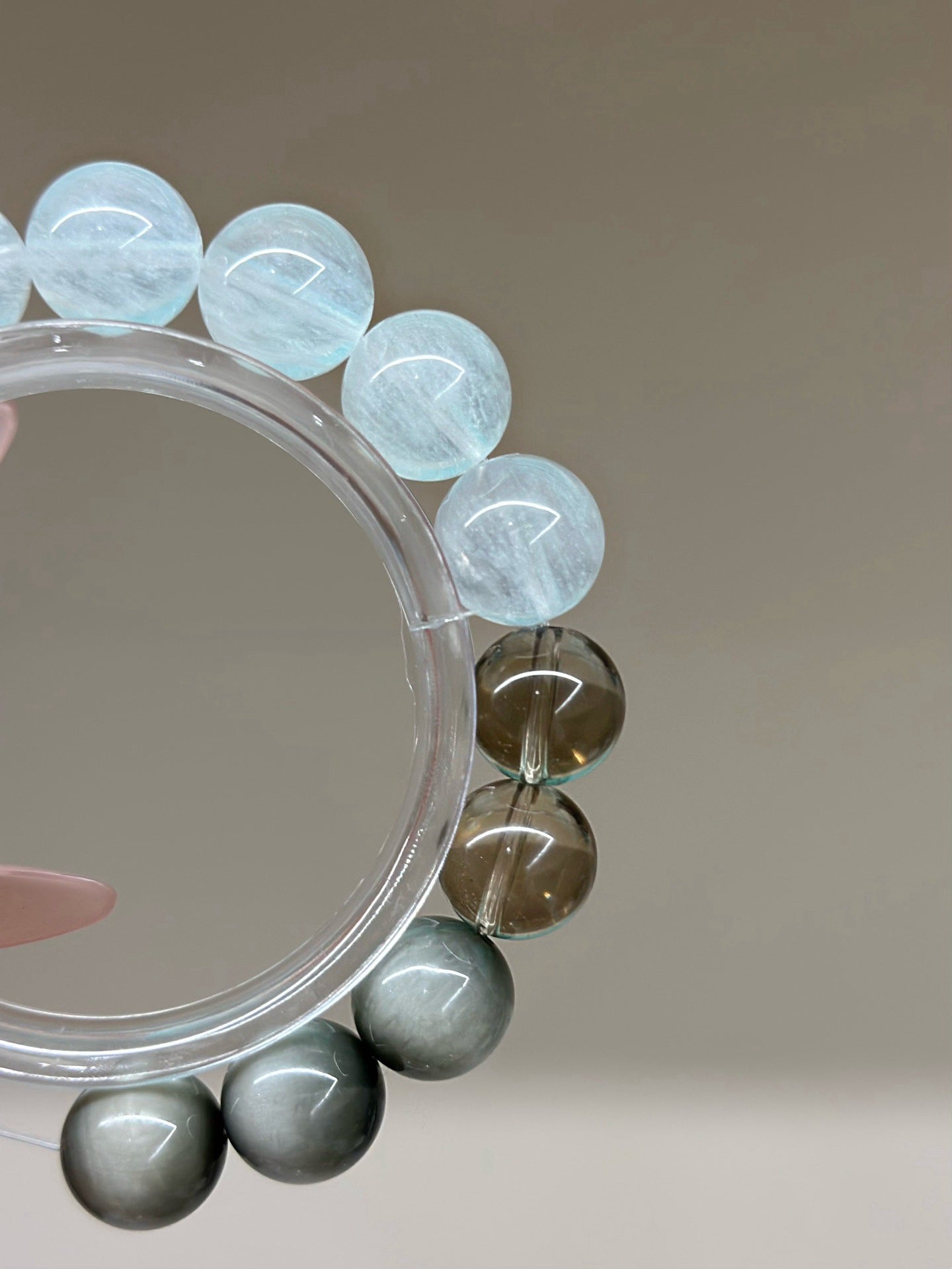 Natural crystal couple bracelet with white fluorite, hawk's eye and smoky quartz