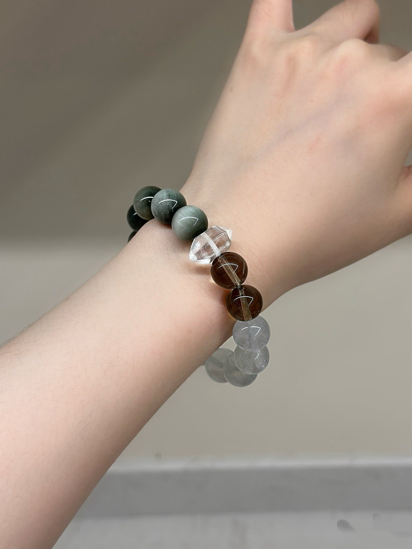 Natural crystal couple bracelet with white fluorite, hawk's eye and smoky quartz